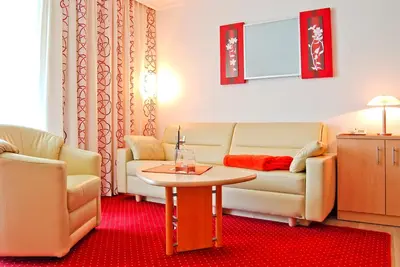 Ein Sitzbereich in der Unterkunft Appartements Kristall