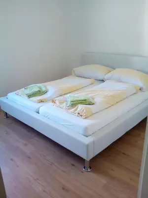 Ein Bett oder Betten in einem Zimmer der Unterkunft Apartment Fewo Irdning Pichlarn