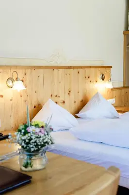 Ein Bett oder Betten in einem Zimmer der Unterkunft Hotel Bischofsmütze