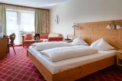 Ein Bett oder Betten in einem Zimmer der Unterkunft Hotel Bischofsmütze