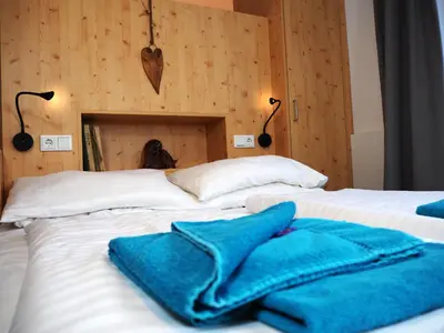 Ein Bett oder Betten in einem Zimmer der Unterkunft DAV-Haus (Alpenverein)