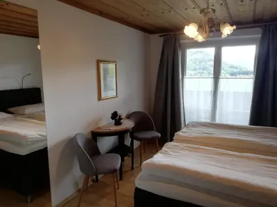 Ein Bett oder Betten in einem Zimmer der Unterkunft Appartements Ferienwohnungen Alpenblick