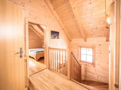 Ein Bett oder Betten in einem Zimmer der Unterkunft Chalet Fredis Hütte by Interhome