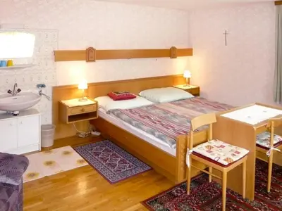 Ein Bett oder Betten in einem Zimmer der Unterkunft Holiday Home Landhaus Prieger by Interhome