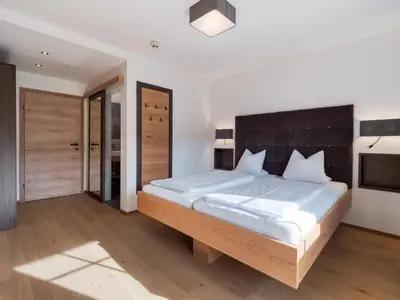 Ein Bett oder Betten in einem Zimmer der Unterkunft Hotel Matschner