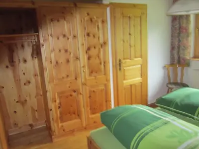 Ein Bett oder Betten in einem Zimmer der Unterkunft Kocherhof