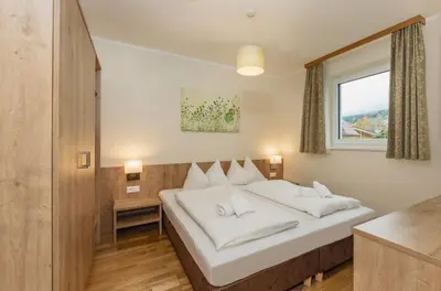 Ein Bett oder Betten in einem Zimmer der Unterkunft Appartement Alpenglocke by Schladming-Appartements