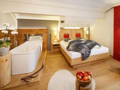 Ein Bett oder Betten in einem Zimmer der Unterkunft Hotel Lärchenhof