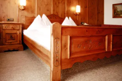 Ein Bett oder Betten in einem Zimmer der Unterkunft Gasthof Weißes Rössl