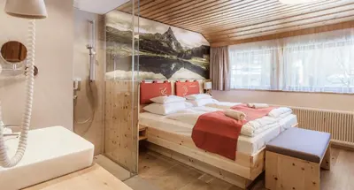 Ein Bett oder Betten in einem Zimmer der Unterkunft schaus Lüftenegger - Apart-Zirbenpension