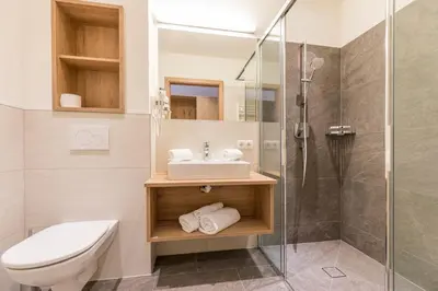 Ein Badezimmer in der Unterkunft OFENTÜRL alpine living