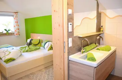 Ein Bett oder Betten in einem Zimmer der Unterkunft Denggnhof