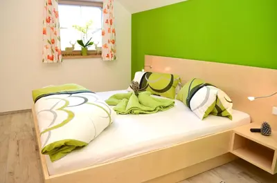 Ein Bett oder Betten in einem Zimmer der Unterkunft Denggnhof