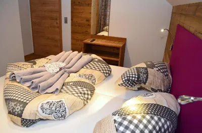 Ein Bett oder Betten in einem Zimmer der Unterkunft Chalet Hoamat