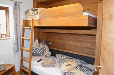 Ein Bett oder Betten in einem Zimmer der Unterkunft Chalet Hoamat