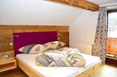 Ein Bett oder Betten in einem Zimmer der Unterkunft Chalet Hoamat