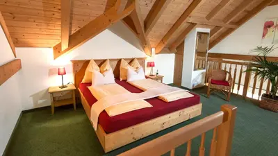 Ein Bett oder Betten in einem Zimmer der Unterkunft Landhaus Leitner am Wolfgangsee