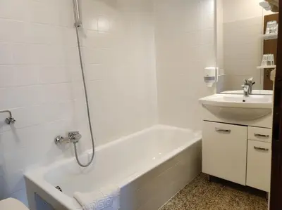 Ein Badezimmer in der Unterkunft B&B Goldener Stern