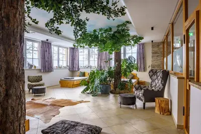 Ein Sitzbereich in der Unterkunft Hubertus Alpine Living