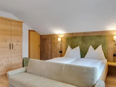 Ein Bett oder Betten in einem Zimmer der Unterkunft Chalet in Kleinarl near Ski Amadé Slopes