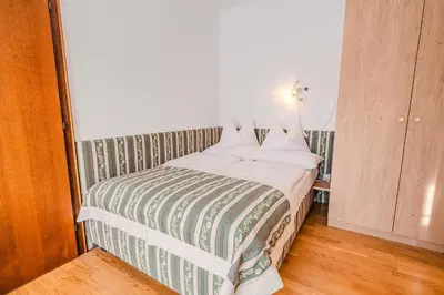 Ein Bett oder Betten in einem Zimmer der Unterkunft Ferienwohnung Floriani