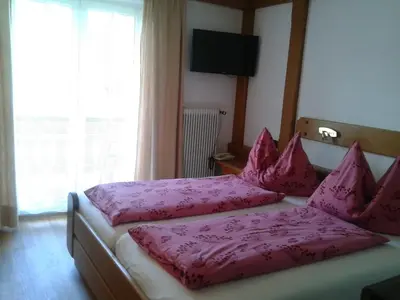 Ein Bett oder Betten in einem Zimmer der Unterkunft Frühstückspension Wagrain - Viktoria Flasch