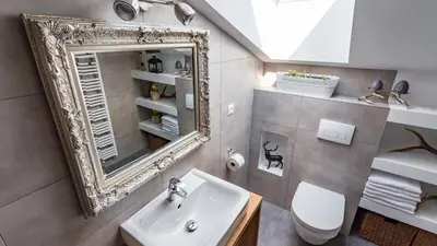 Ein Badezimmer in der Unterkunft Alpenhaus Dachstein.Zauber