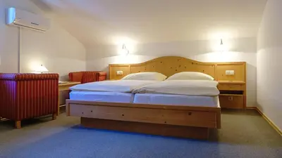 Ein Bett oder Betten in einem Zimmer der Unterkunft Pension Wanderruh