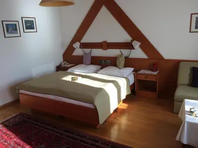 Ein Bett oder Betten in einem Zimmer der Unterkunft Seehotel Schwan