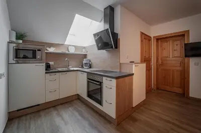 Küche/Küchenzeile in der Unterkunft Landhotel - Apartments Bauer