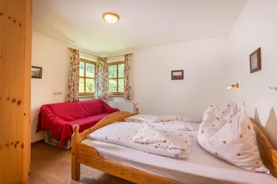 Ein Bett oder Betten in einem Zimmer der Unterkunft Hacklgut