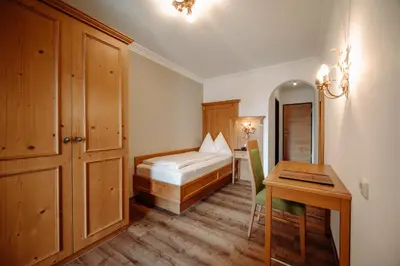 Ein Bett oder Betten in einem Zimmer der Unterkunft Hotel Lerch