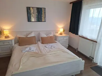 Ein Bett oder Betten in einem Zimmer der Unterkunft Berggasthof Schwaigerhof