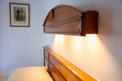 Ein Bett oder Betten in einem Zimmer der Unterkunft Landhotel Post Ebensee am Traunsee ***S