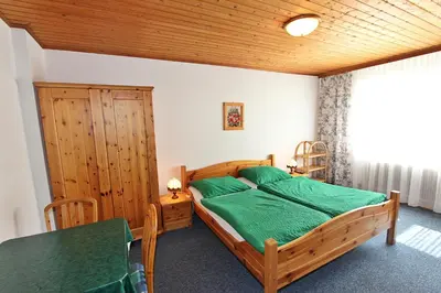 Ein Bett oder Betten in einem Zimmer der Unterkunft Pension Sybille