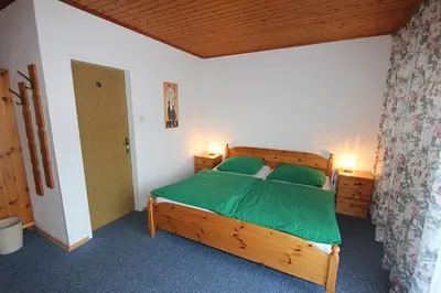 Ein Bett oder Betten in einem Zimmer der Unterkunft Pension Sybille