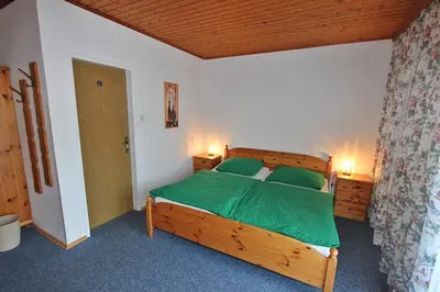 Ein Bett oder Betten in einem Zimmer der Unterkunft Pension Sybille