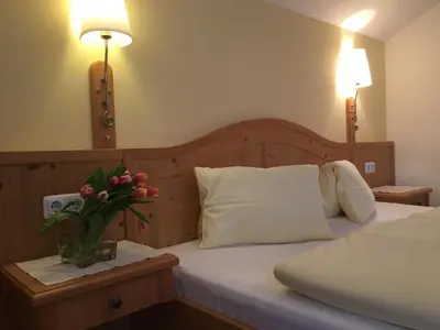 Ein Bett oder Betten in einem Zimmer der Unterkunft Gasthof Botenwirt