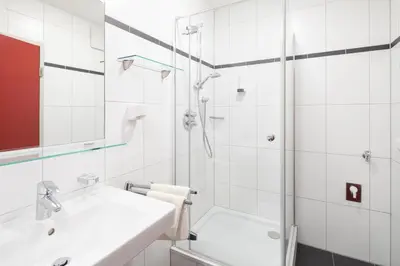 Ein Badezimmer in der Unterkunft Sunshine Appartements Schilchegger