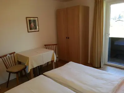 Ein Bett oder Betten in einem Zimmer der Unterkunft Rupertihof