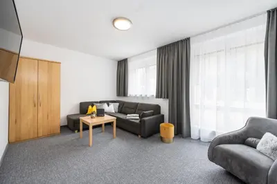 Ein Sitzbereich in der Unterkunft Appartements Insieme