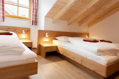 Ein Bett oder Betten in einem Zimmer der Unterkunft Standlhof