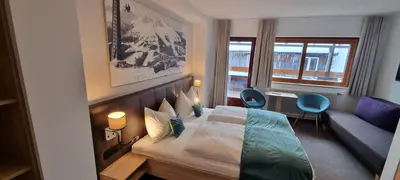 Ein Bett oder Betten in einem Zimmer der Unterkunft Gasthof Kirchenwirt