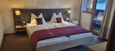 Ein Bett oder Betten in einem Zimmer der Unterkunft Gasthof Kirchenwirt