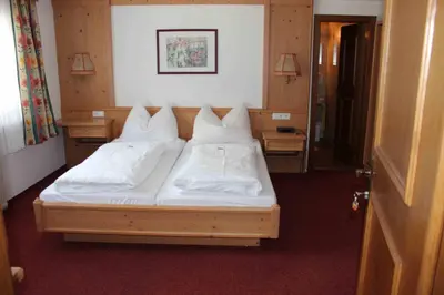Ein Bett oder Betten in einem Zimmer der Unterkunft Unterhagmooshof