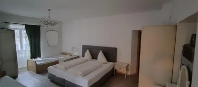 Ein Bett oder Betten in einem Zimmer der Unterkunft Hotel Gasthof Markterwirt