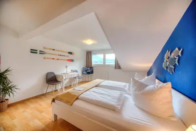 Ein Bett oder Betten in einem Zimmer der Unterkunft Seepension Hemetsberger