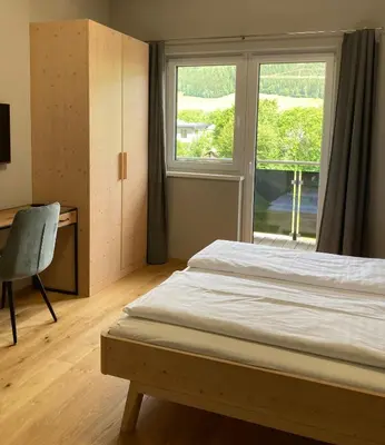 Ein Bett oder Betten in einem Zimmer der Unterkunft Appartement Hochfilzer