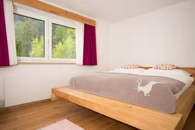 Ein Bett oder Betten in einem Zimmer der Unterkunft Apartmenthaus Lieselotte