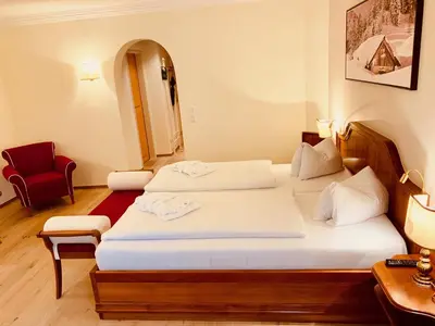 Ein Bett oder Betten in einem Zimmer der Unterkunft Hotel Zum Jungen Römer